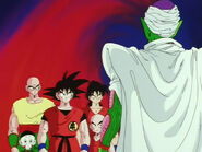 Kuririn and the gang stare at Piccolo.