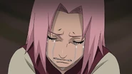 Sakura cries as Sai tells her that Naruto's promise to bring Sasuke back to Konoha is what's making him suffer the most.