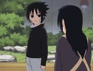 Sasuke about to tell his mother something; but decides not to.