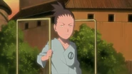 Shikamaru sees how the villagers treat Naruto with cold eyes.