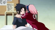 Sasuke being hugged by Sakura after Tsunade wakes him up from Itachi's genjutsu.