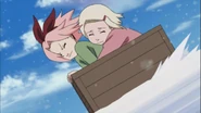 Sakura and Ino snowboarding.