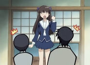 Tohru tells Yuki and Shigure that she doesn't mind cleaning up.