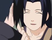 Mikoto smiles as she treats Sasuke's injuries.