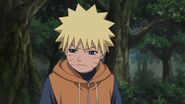 Naruto angrily thinks about his life as an Orphan while he doesn't look at Iruka.