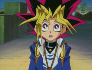 Yugi sees Joey trying to go on the ship for the Duelist Kingdom Tournament.