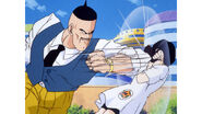 Videl protects herself against the robber