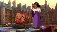 Quasimodo looks at Esmeralda