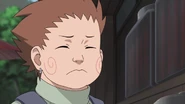 Choji asking Shikamaru what kind of snacks should he bring back with him to class.