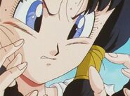 Videl trys control her Ki energy with her hands in order to fly