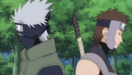 Kakashi and Tenzo going their separate ways now that Kakashi is a Jonin Sensei.