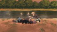 Shikamaru lies on the ground after his memories of Yota are erase.