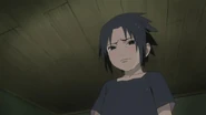 Sasuke crying after he shares the same fate as Naruto; being an orphan.