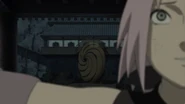 Sakura and Tobi aka Obito.