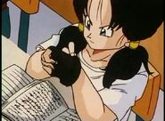 Videl is learning that Red Shark Gang is after her father by using major hostage