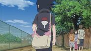 Sasuke walking home, while not even caring that there are flowers in his bag.