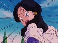 Videl is seeing Gohan fly while playing baseball in Orange Star High School