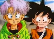 Trunks and Goten watches Gohan fighting Broly