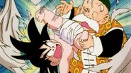 Goku being pick up by Grandpa Gohan after he ripped the sheet bed apart.