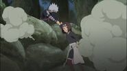 Kakashi and Rin are force to leave Obito behind.