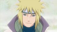 Minato smiling at Naruto before he fades into Heaven.