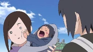 Sasuke cries while pushing Izumi away.