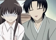 Tohru and Shigure watching Yuki and Kyo fighting.