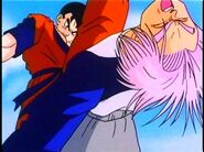 Future Gohan kicks Trunks.