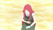 Kushina laughing as Naruto thinks that she is Kurama's true form.