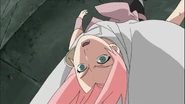 Sakura tries to help Kakashi battle Sasuke.