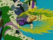 Gohan lands a powerful kick to Perfect Cell's stomach, making him regurgitate Android 18