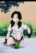 Videl is landing on the ground after she back-flips