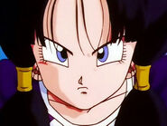 Videl stared her serious face at Gohan after he's saving her from the water tower on the burning building