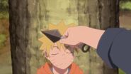 Naruto closes his eyes as Iruka marks his future height on the tree.