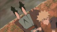 Naruto lies on the ground after Yota erases his memory.