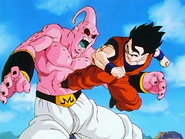 Gohan dominates Super Buu after having his hidden power released by Old Kai