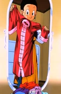 Chi-Chi holds a dress