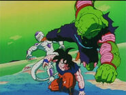 Goku has been saved by Piccolo from Frieza