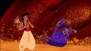 Magic Carpet tells Aladdin to follow him.