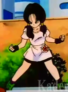 Videl with her long hair in pigtails to save Major and her father with Gohan from Red Shark Gang