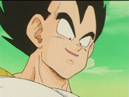 Vegeta feeling in a good mood from believing he had obtained all the Dragon Balls shows some mercy and let's Gohan live but still knees him in the stomach before taking off