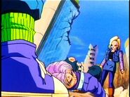 Future Trunks lays on the ground in his base form.