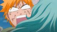 Ichigo screams in pain as Nel is hugging him too tightly.