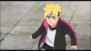 Boruto decides not to lose his match because his father is watching