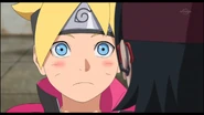 Boruto blushes after Sarada tells him that his eyes are more bluer than Naruto.