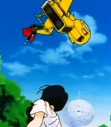Videl saw the Great Saiyaman flying away with her jet helicopter