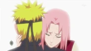 Sakura thanks Naruto for saving Konoha from Pain.