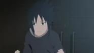 Sasuke after Itachi throws a shuriken at him.