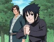 Sasuke prepares to do the Great Fire Ball Technique.