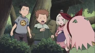 Choji is shock that Sakura was spying on them.